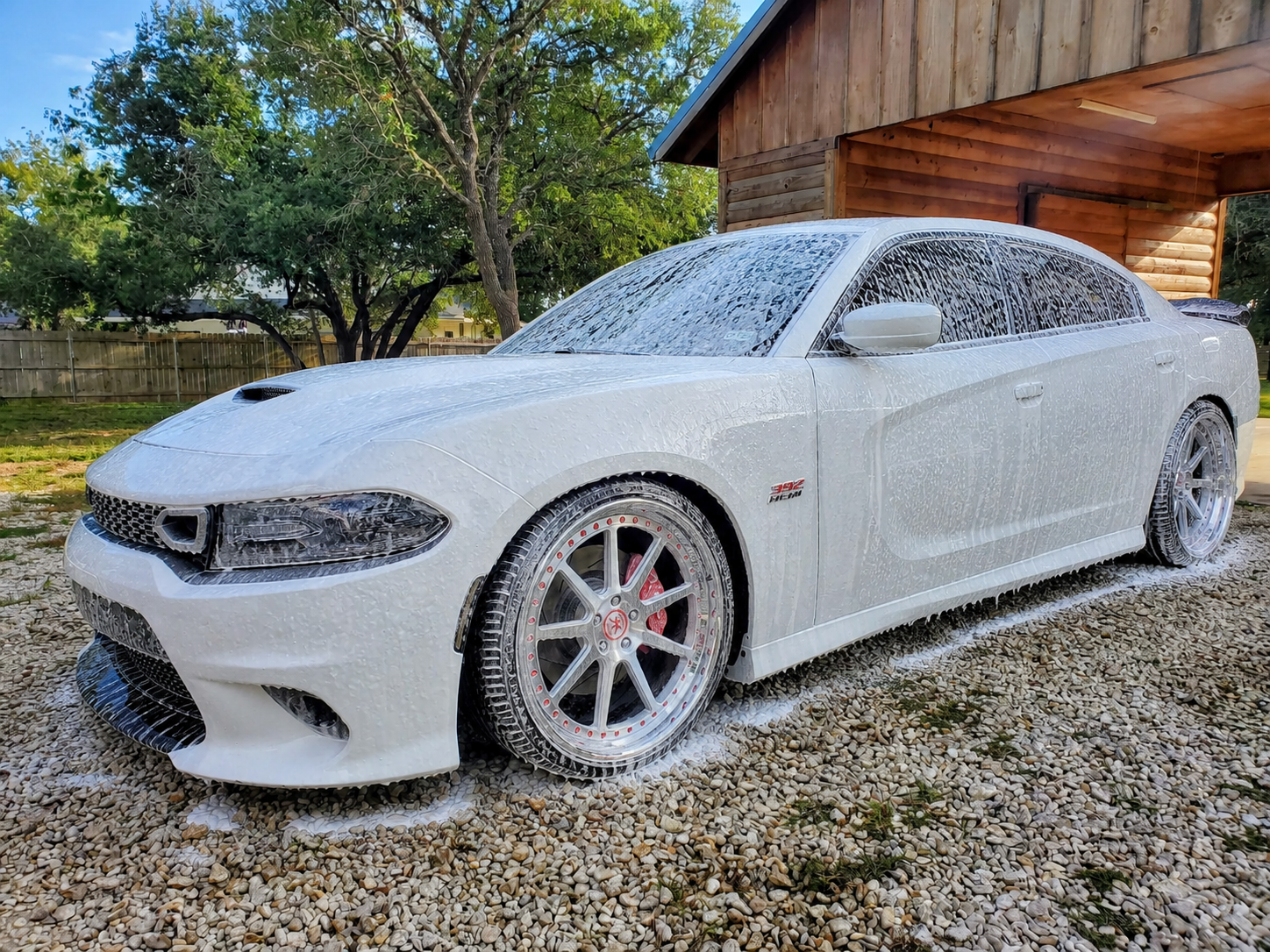 White Charger covered in car-wash foam
